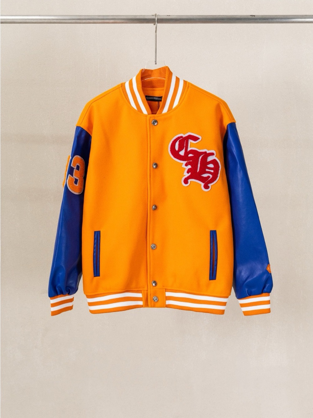 Chrome Hearts Orange and Blue Varsity Jacket